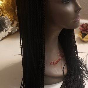 Beautiful side part braided wig.